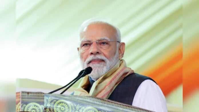 PM Modi in Assam: असम रैली में मोदी का तंज, कांग्रेस पर असम को खोने की साजिश रचने का आरोप