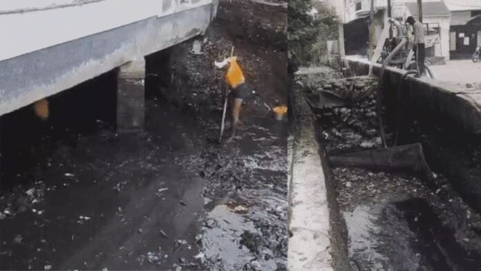 गोरखपुर में बारिश ने रोका नाला सफाई का काम, सड़क का हिस्सा धंसा; पंपिंग सेट नाले में गिरा
